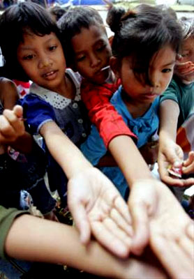 Children receive candy