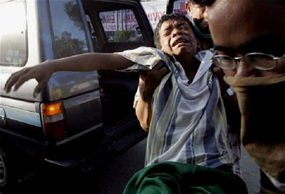 An injured boy is taken to a hospital