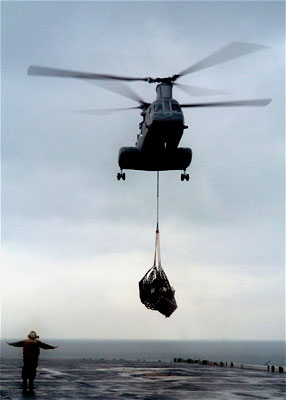 A U.S. Navy helicopter on an aid mission